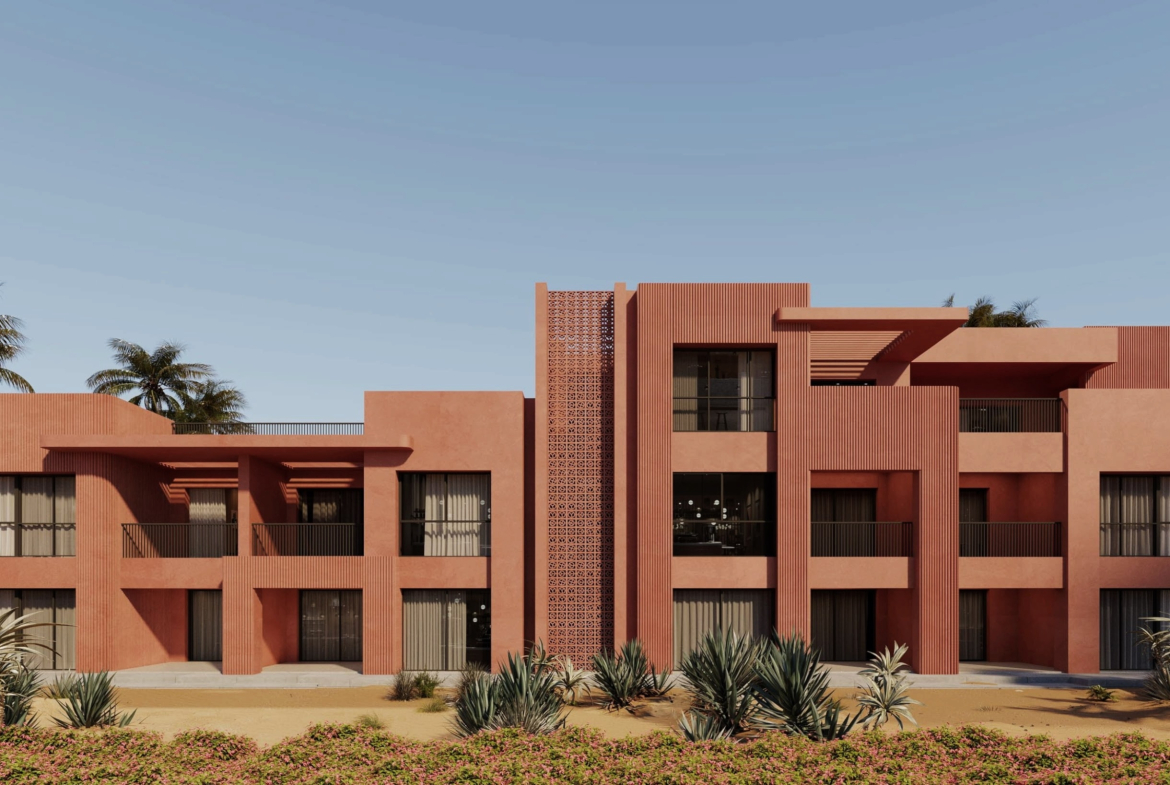 Exterior view of Coral Coves Apartments with modern Mediterranean-inspired architecture