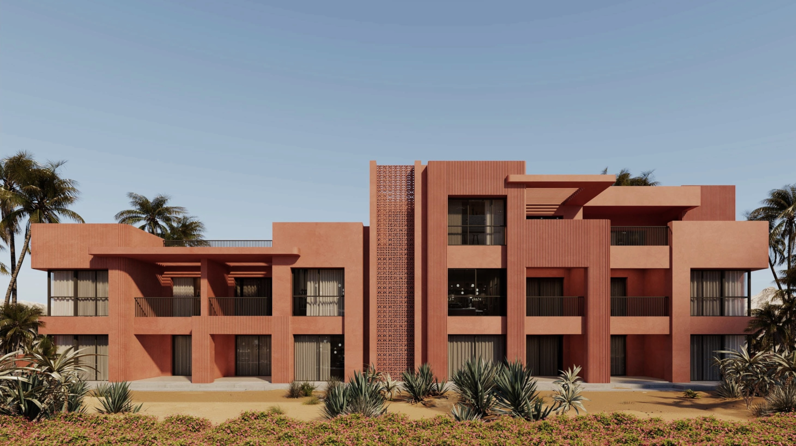 Exterior view of Coral Coves Apartments with modern Mediterranean-inspired architecture