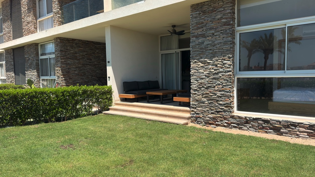 Garden-facing bedroom at Bay Central Somabay apartment