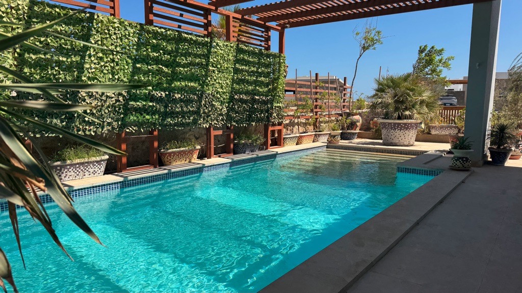 Swimming pool and terrace at Wadi Jebal chalet