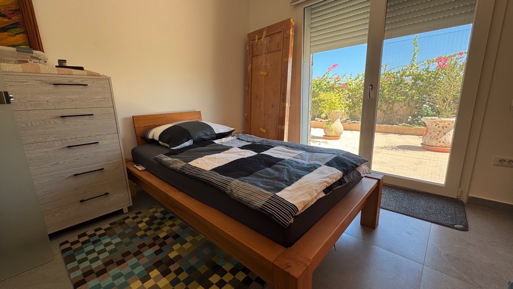 Bedroom with garden view at Wadi Jebal chalet
