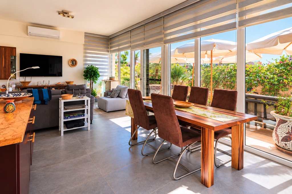 Dining room overlooking landscaped outdoor area